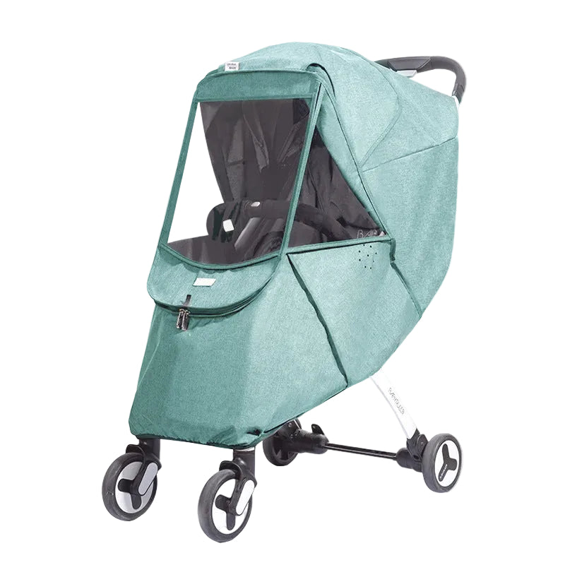 Green baby stroller with a clear rain cover on a white background, featuring the 'love little me' brand.