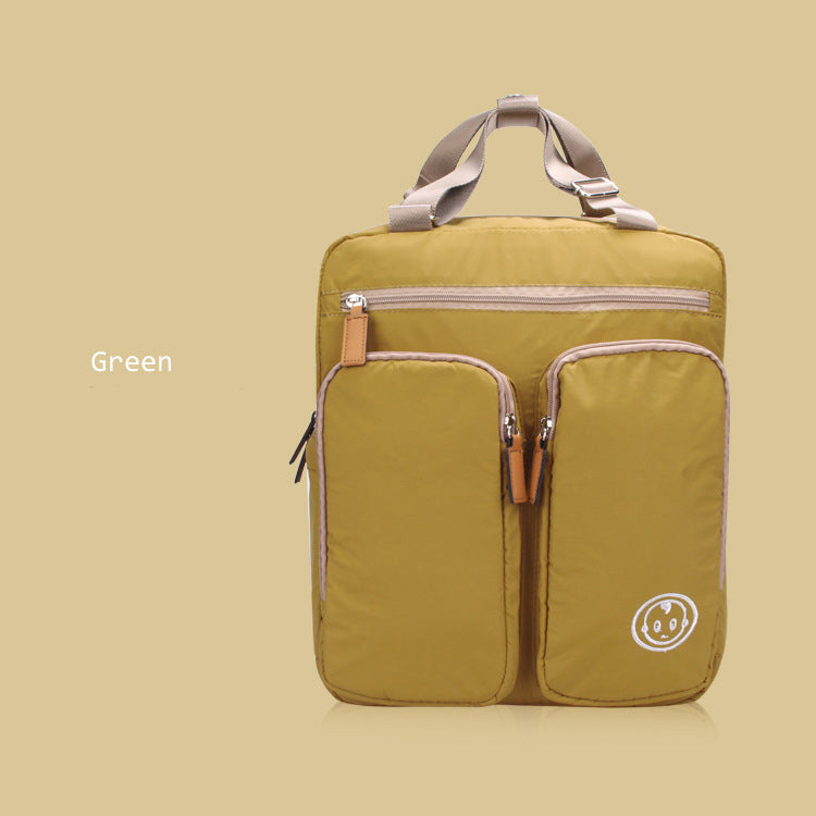 Green backpack with a visible brand logo on a beige background