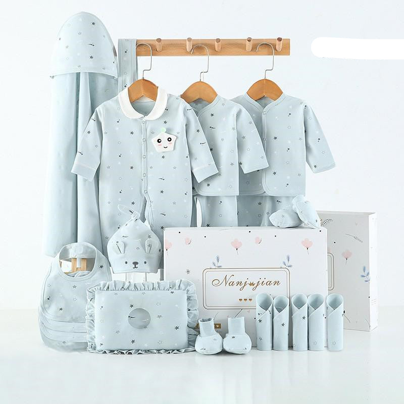 Collection of baby clothing and accessories with a 'warm' label on a white background.