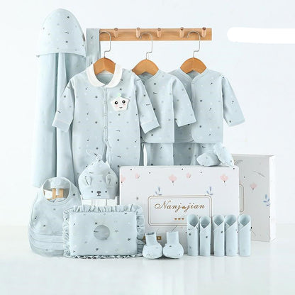 Collection of baby clothing and accessories with a 'warm' label on a white background.