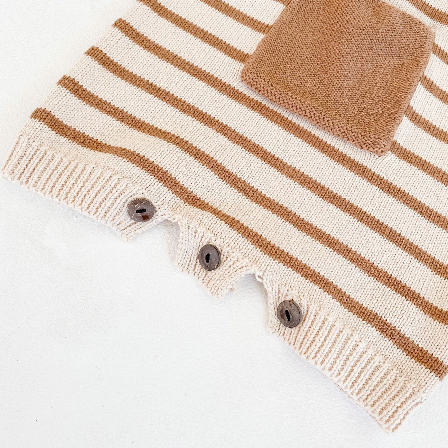 Knitted woolen jumpsuit for babies and infants