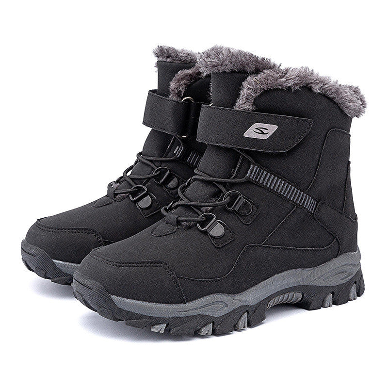 Black winter boots with gray fur lining on a white background