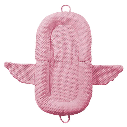 Pink baby nest with dimensions 95*55cm on a beige background
