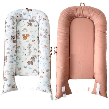 Floral SnuggleNest™ Portable Newborn Crib – Soft, Safe & Travel-Ready