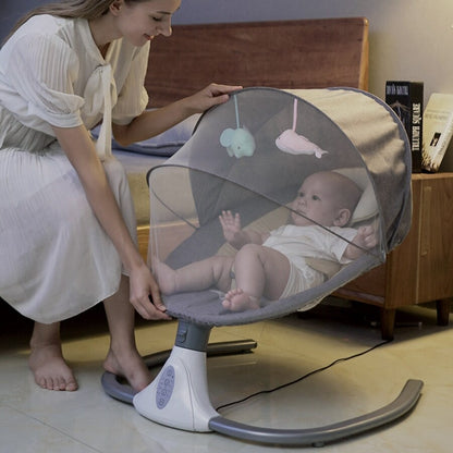 Woman adjusting a baby swing with a baby inside, in a home setting.